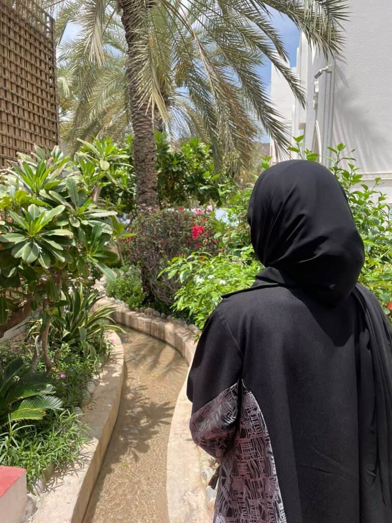 Walking in the garden of Bait Al Zubair museum