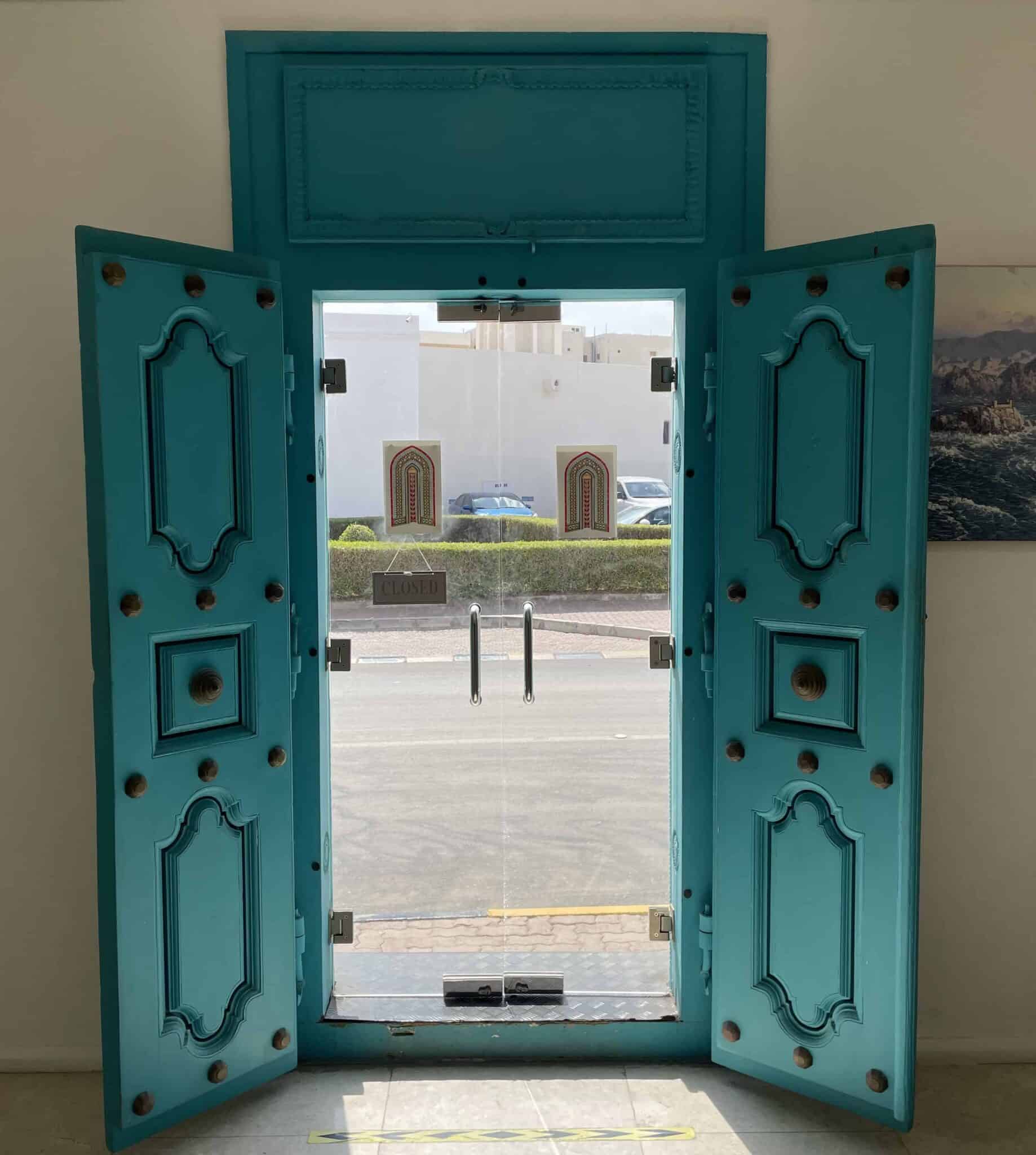 Door of Kadm Café in Muscat