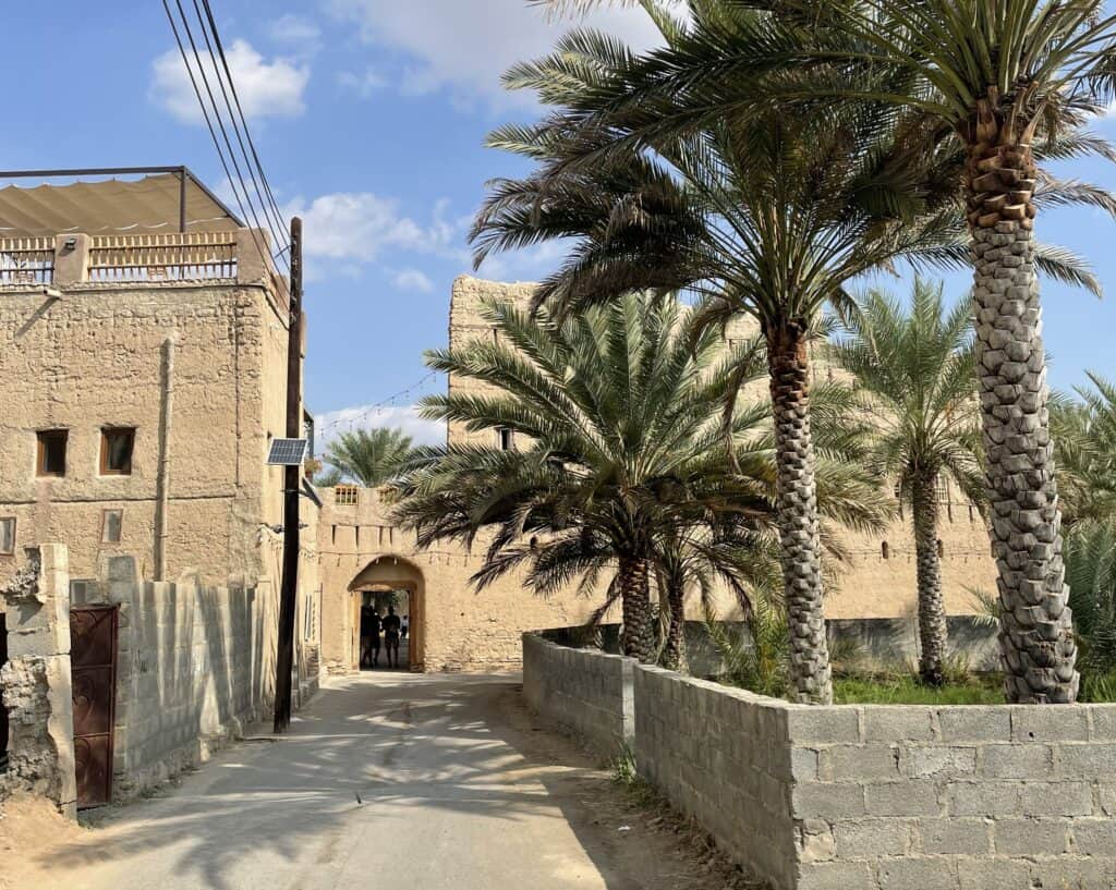 The beginning of Sibani lane with its beautiful gate