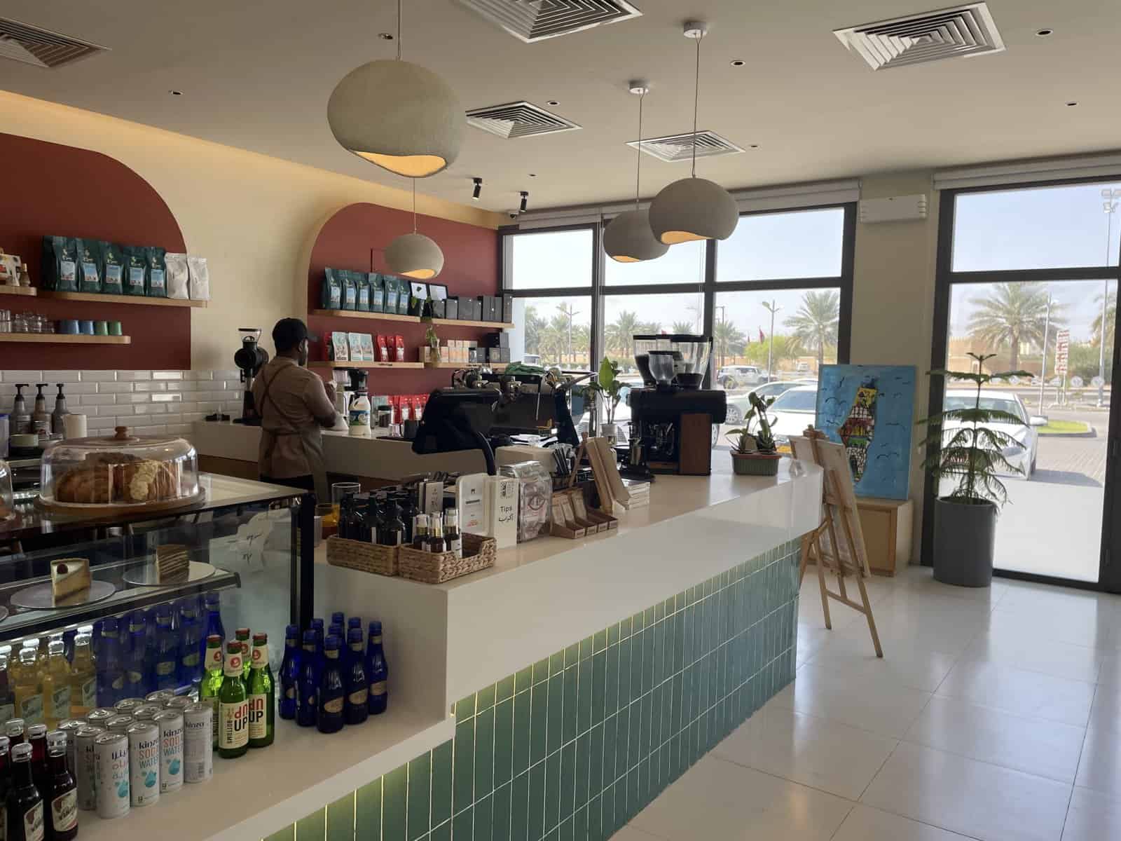 Waiters making coffee in Alam Café, Birkat al Mouz