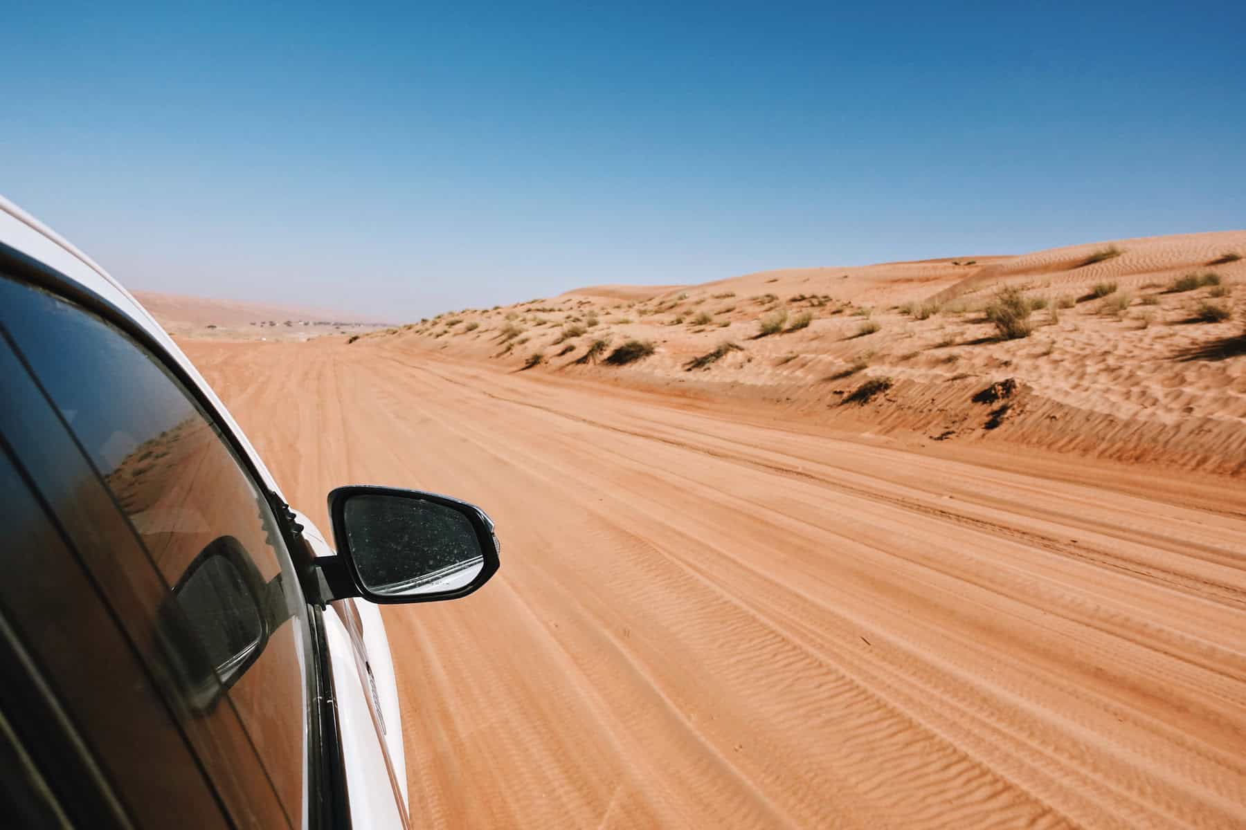 Driving in Omani desert