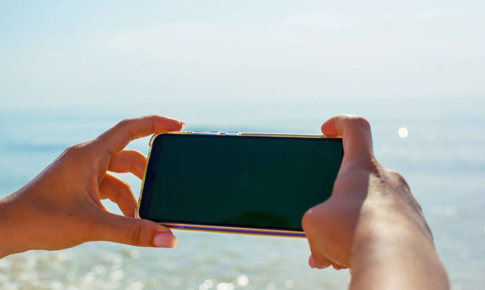 Taking a photograph at the beach