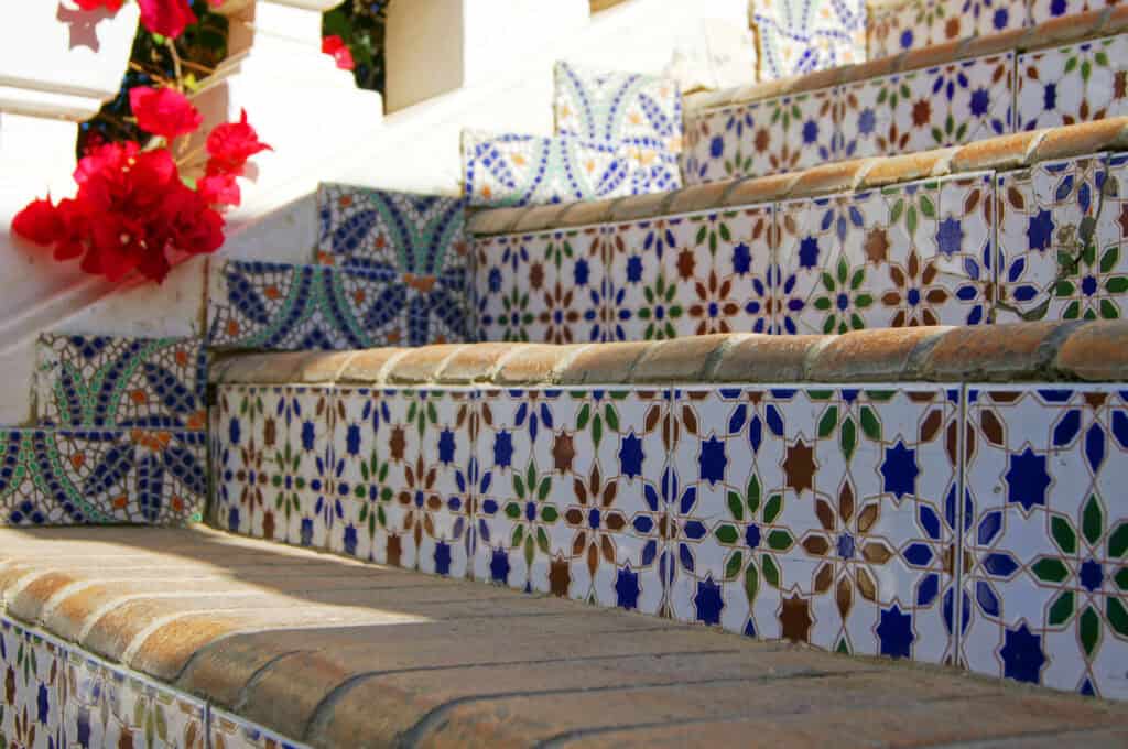 Traditional arabic architecture surrounding exotic plants