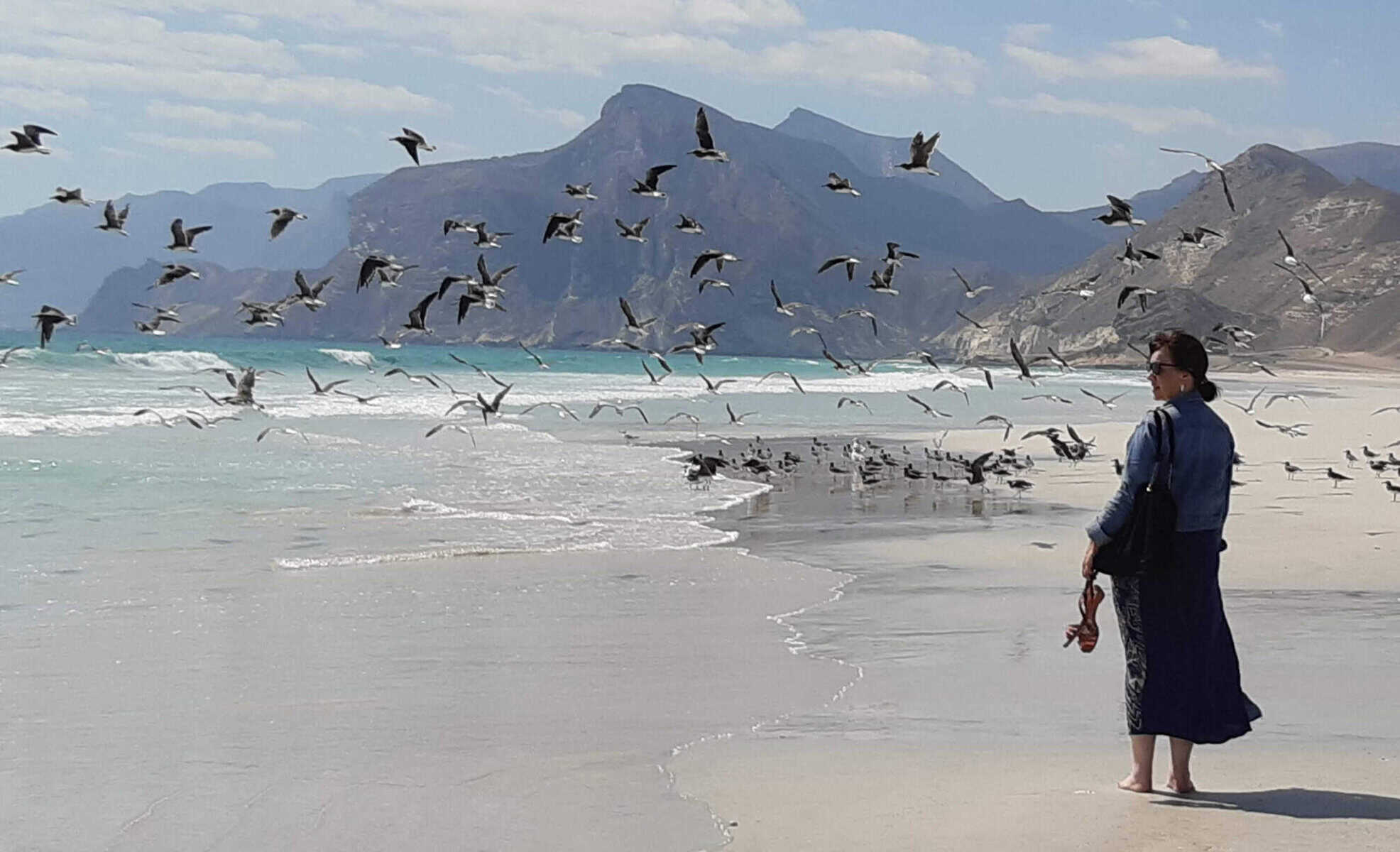 Christine walking on Mughsail beach