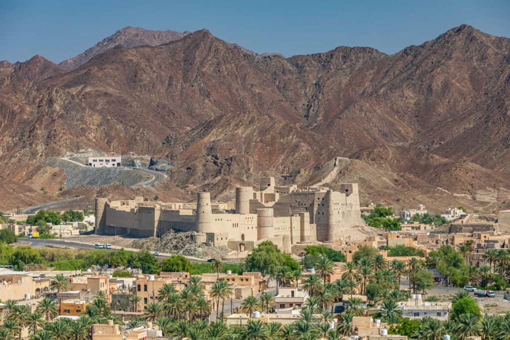 View of the town of Bahla with its imposing fort and the Hajar mountains in the background