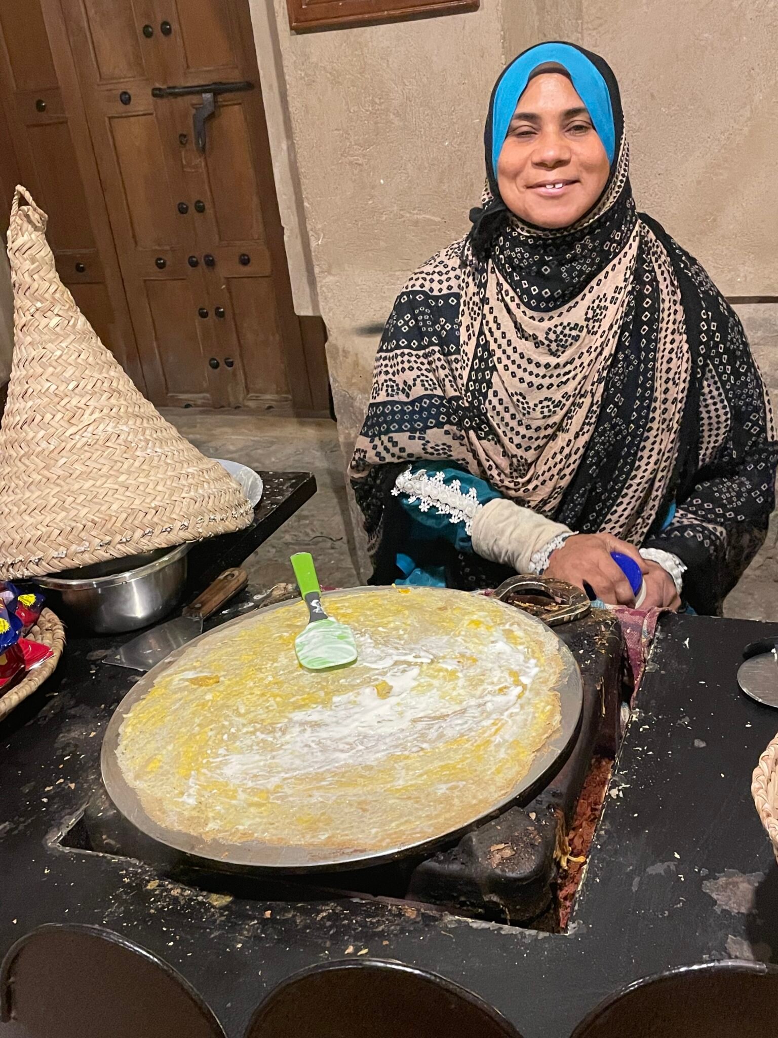 Omani woman making traditional bread